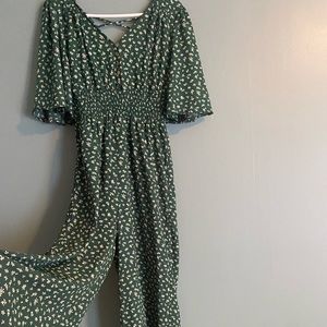 Adorable dark green floral jumpsuit - x back detail via Nordstrom